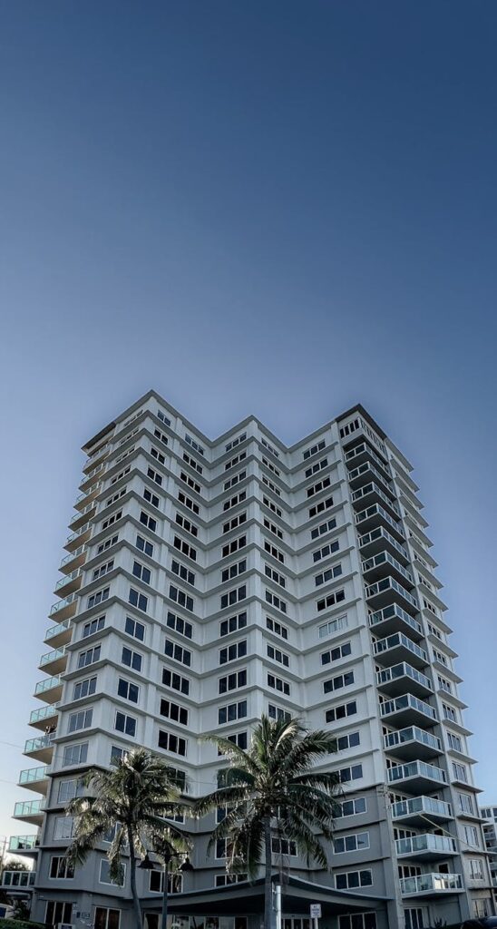 Low-Angle Shot of a High Rise Building under the Blue Sky